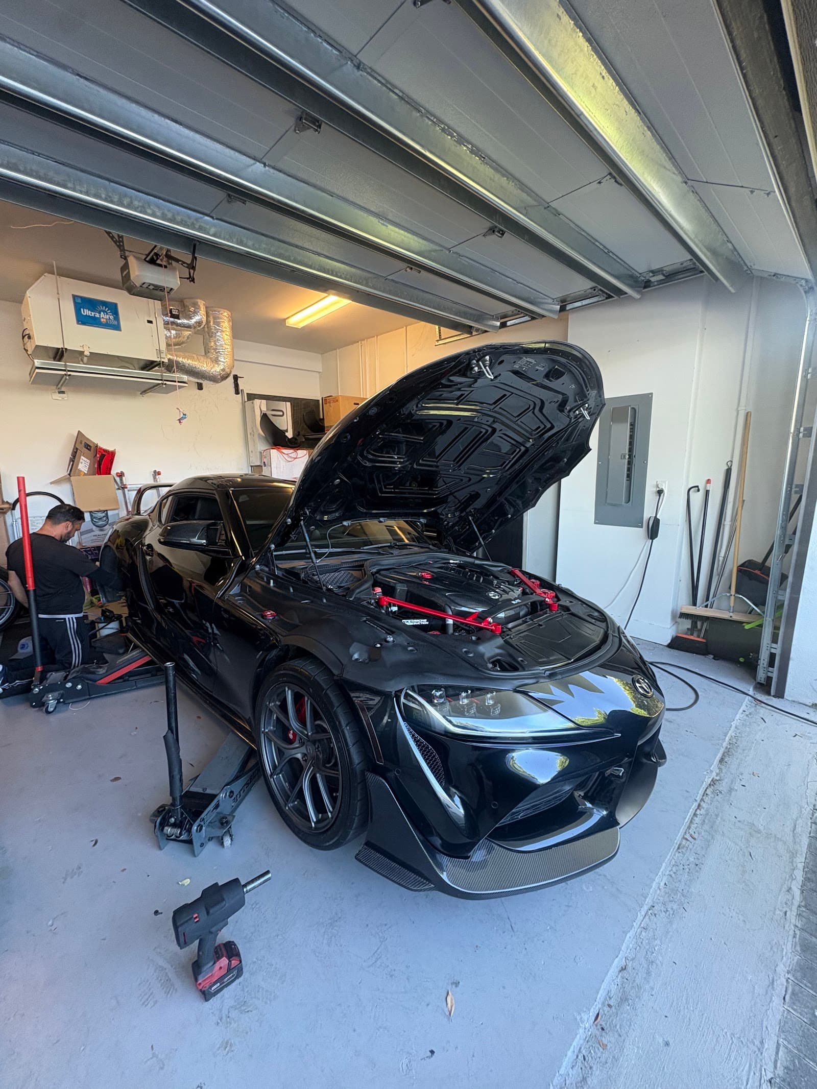 Mobile Mechanic R&R working under the hood